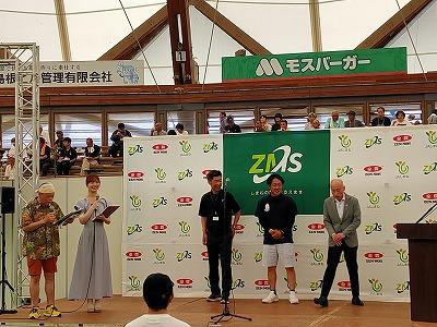 ③-⑩農機総合展示会ステージ（全員）.jpg